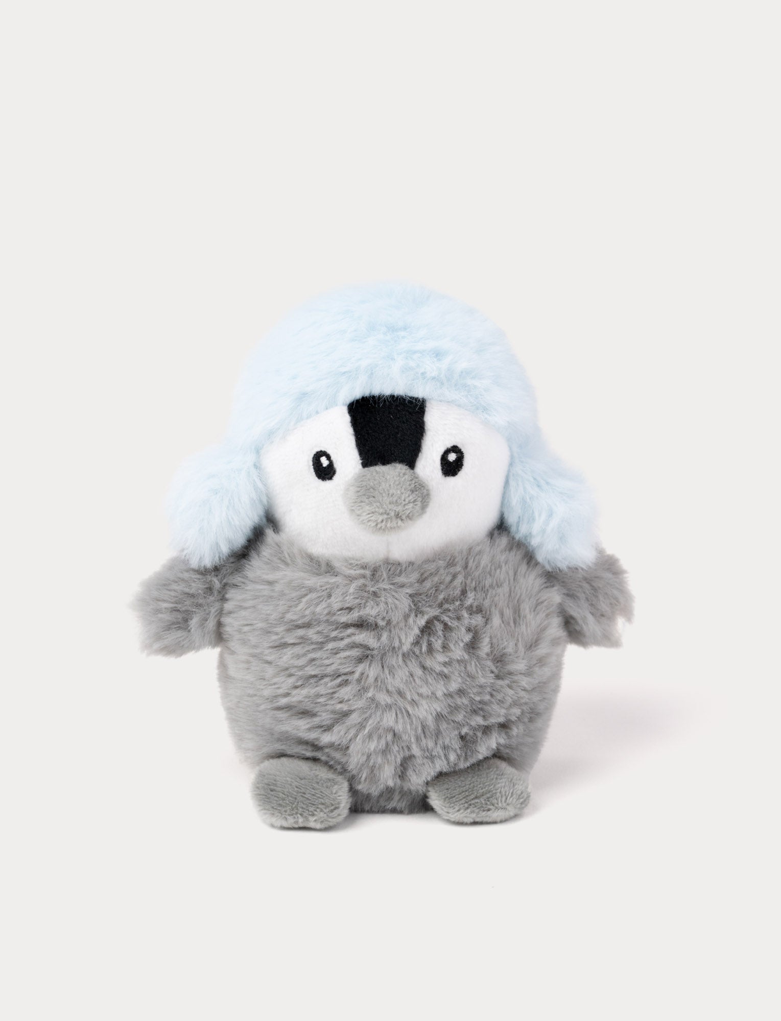 Image of Fluffy grey penguin plush with a light blue hat.