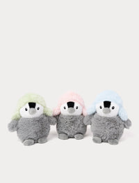 Three plush penguins with colorful hats on a white background