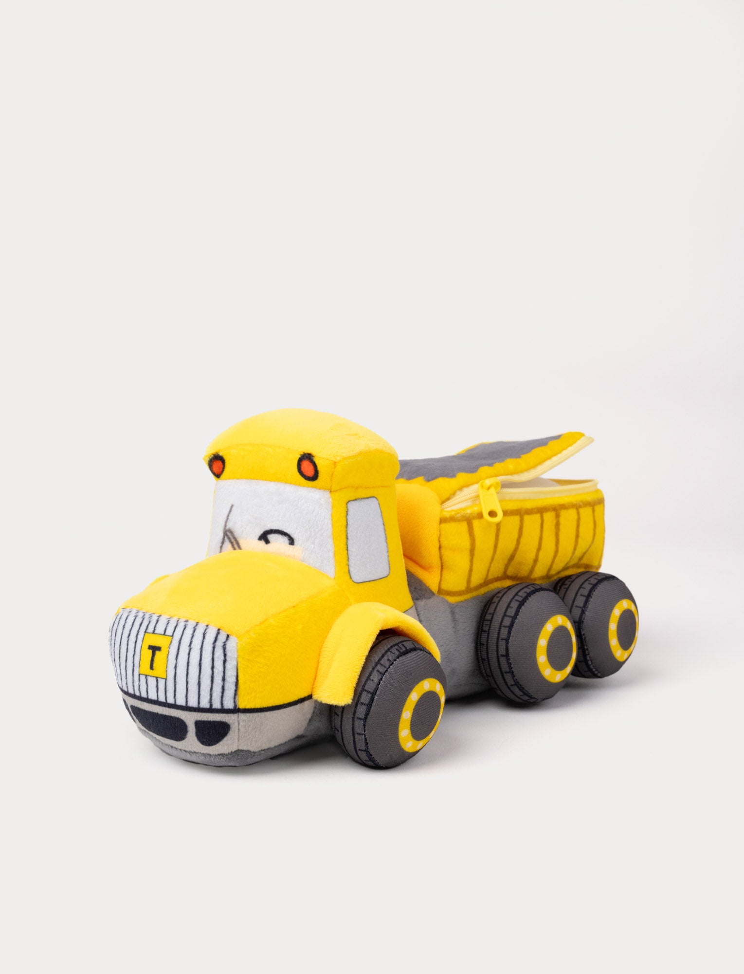  Image of Soft plush yellow dump truck toy with six wheels and an openable cargo bed with zipper.