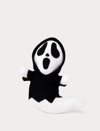 Soft ghost plush toy with black hood and glow-in-the-dark effect.
