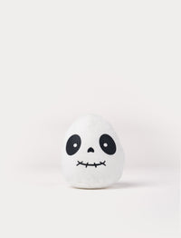Soft white ghost plush toy with stitched smile and glow-in-the-dark effect