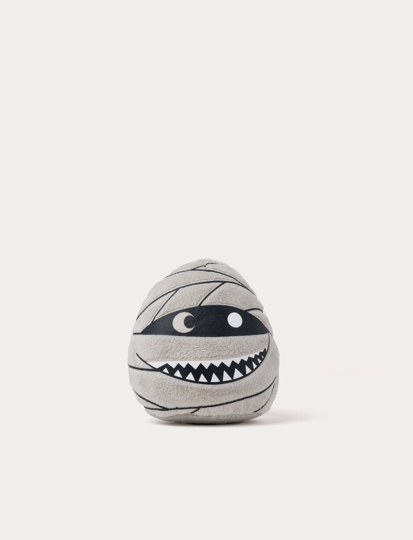 Soft grey mummy plush toy with glow-in-the-dark effect.