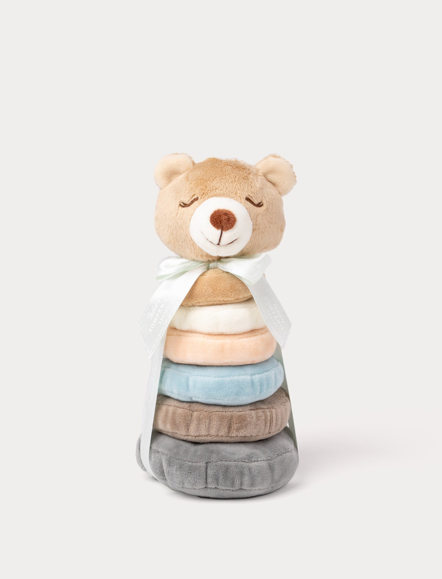  Image of Soft teddy bear stacking toy with pastel plush rings in neutral colours.