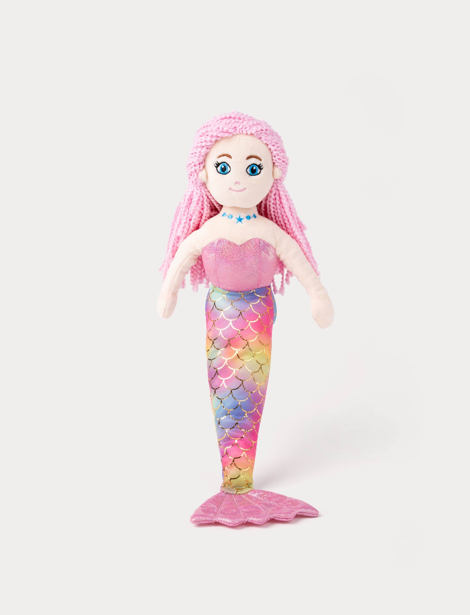  Image of Mermaid doll with pink hair and a multicolored tail on a white background