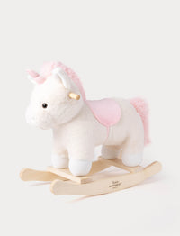 Plush white unicorn rocking toy with pink mane, tail, horn, and saddle on a wooden rocker base