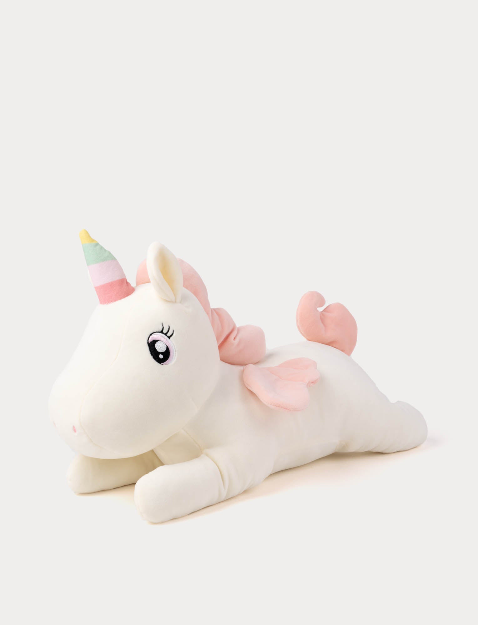  Image of White unicorn plush toy with a rainbow horn