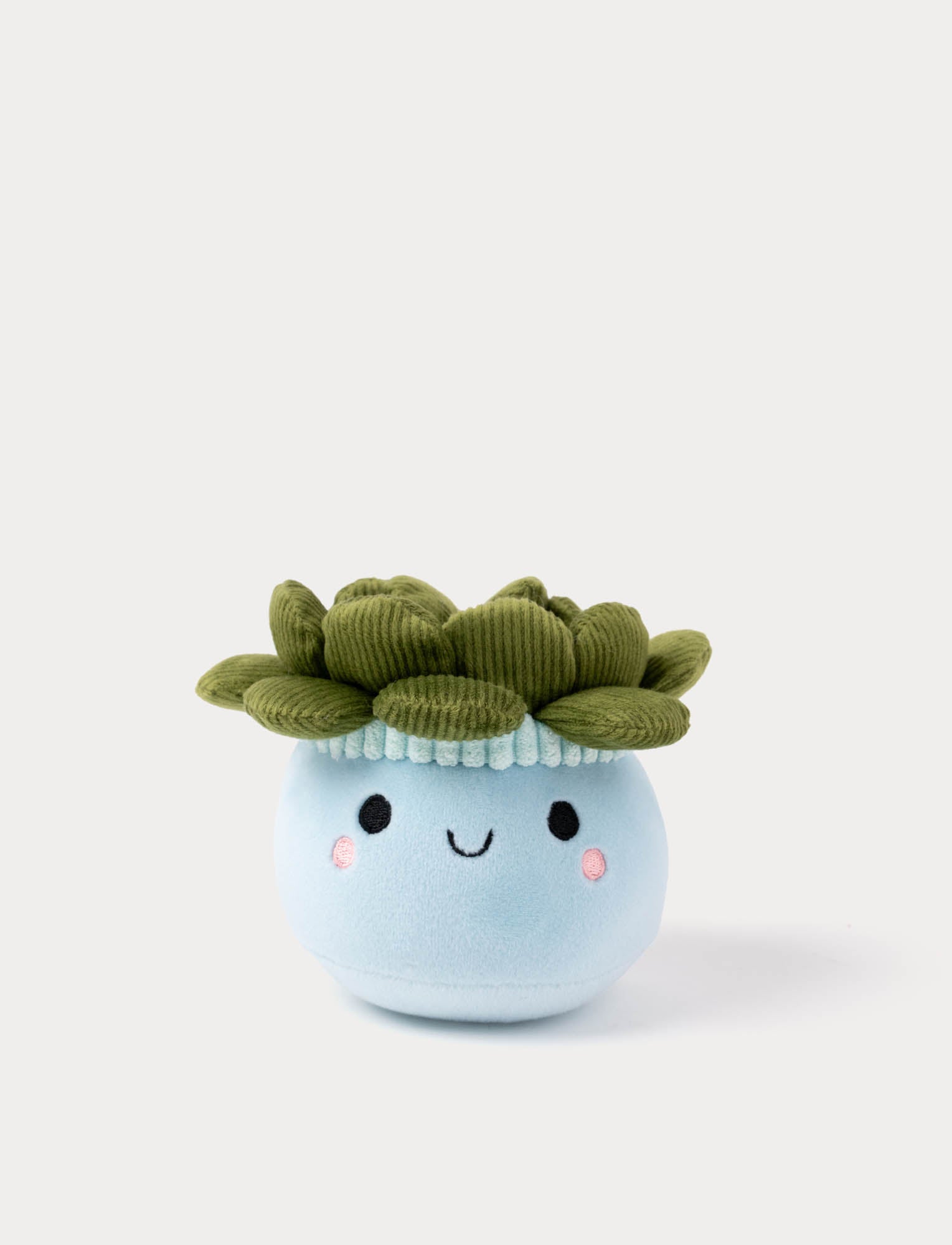  Image of Plush toy flowerpot with a face and green leaves on a white background