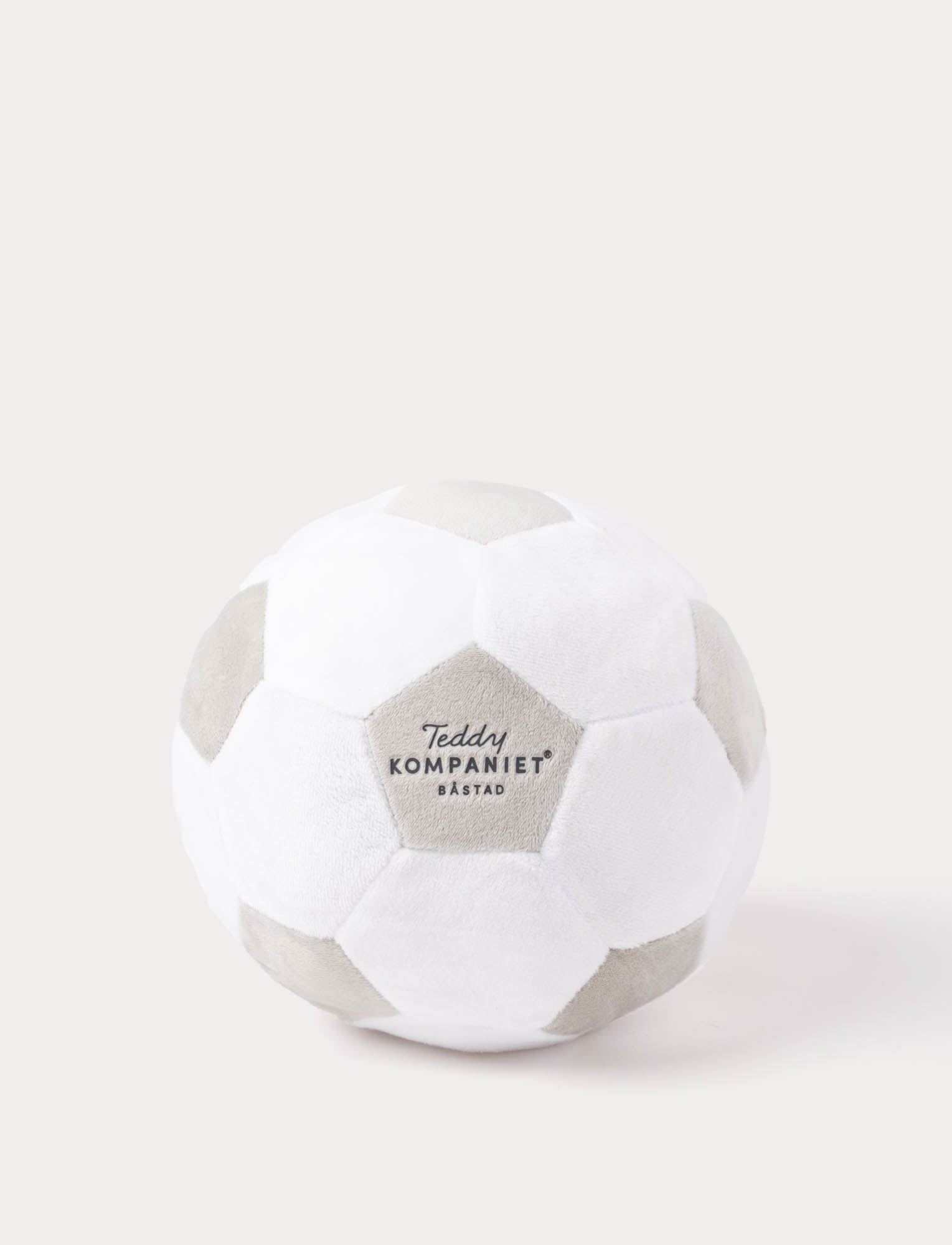  Image of White and gray plush soccer ball with 'Teddykompaniet' branding on a white background