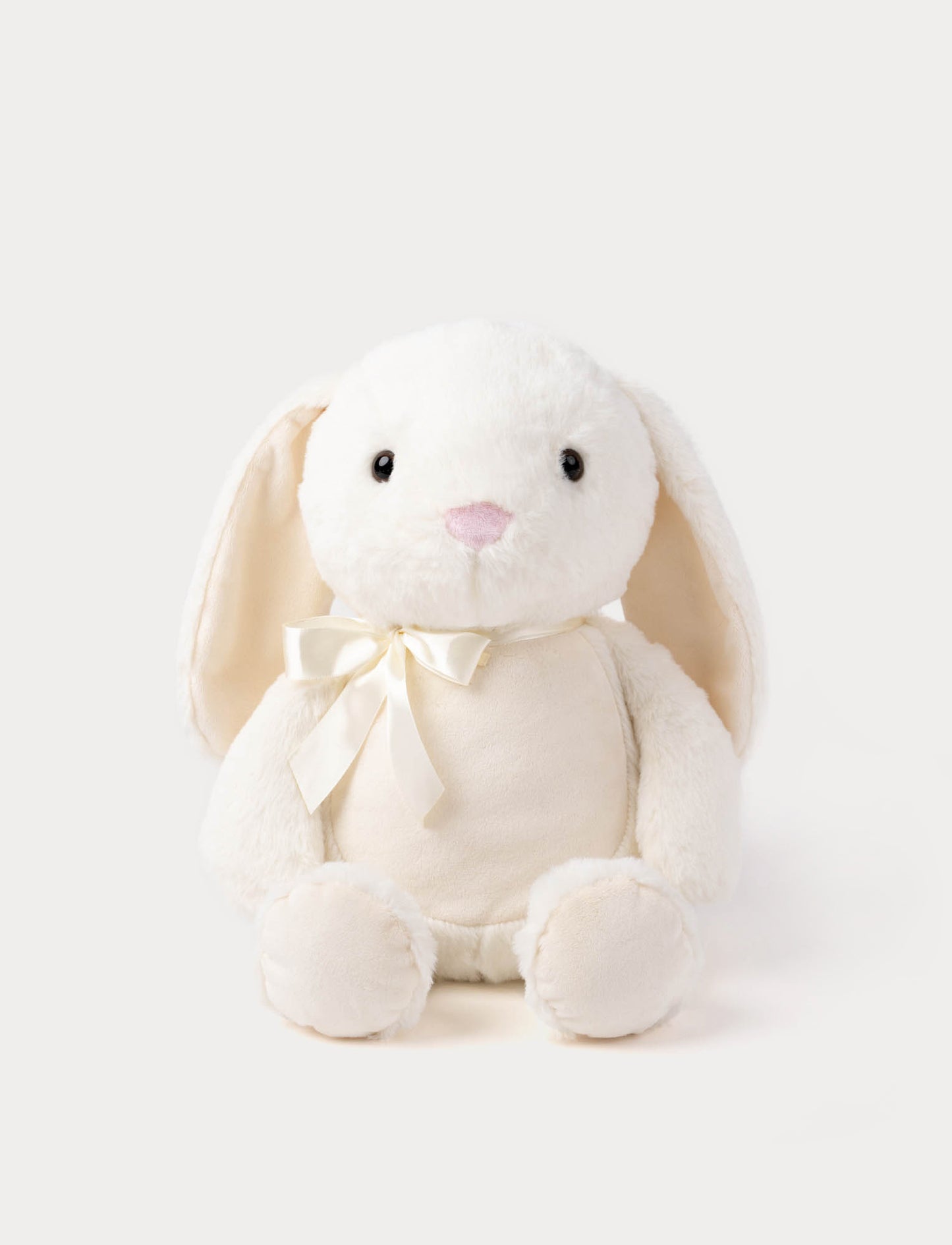 White plush bunny with a satin bow 