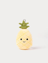 Plush pineapple keychain with a happy face on a white background