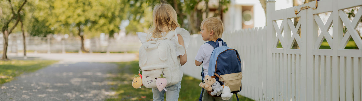  Image of files/4368_4367_2KidsWalkingFence_HIGH.jpg