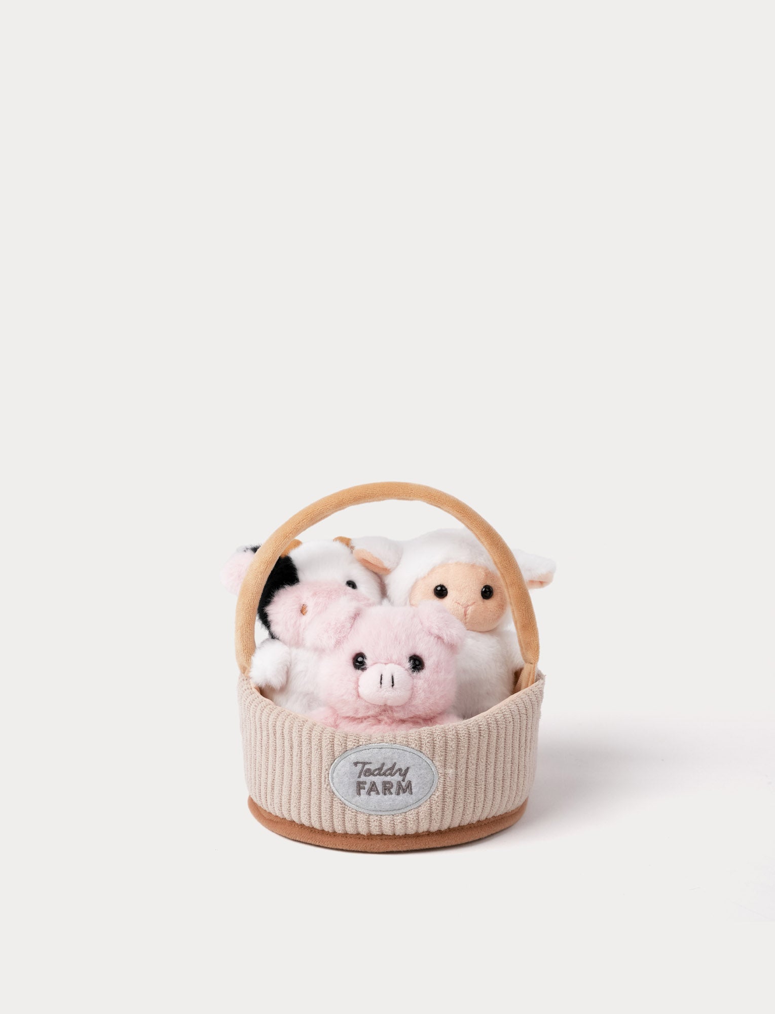  Image of Plush toy animals in a basket with 'Teddy Farm' label on a white background
