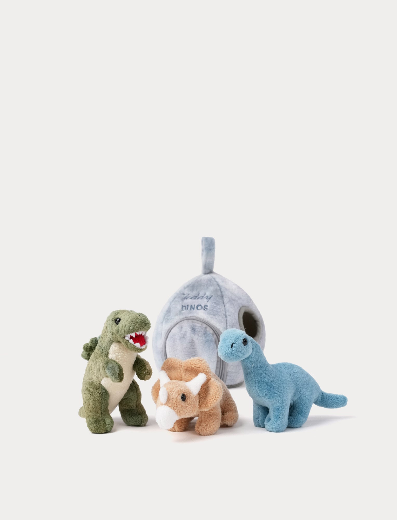  Image of Three plush dinosaur toys in front of a small gray dino egg