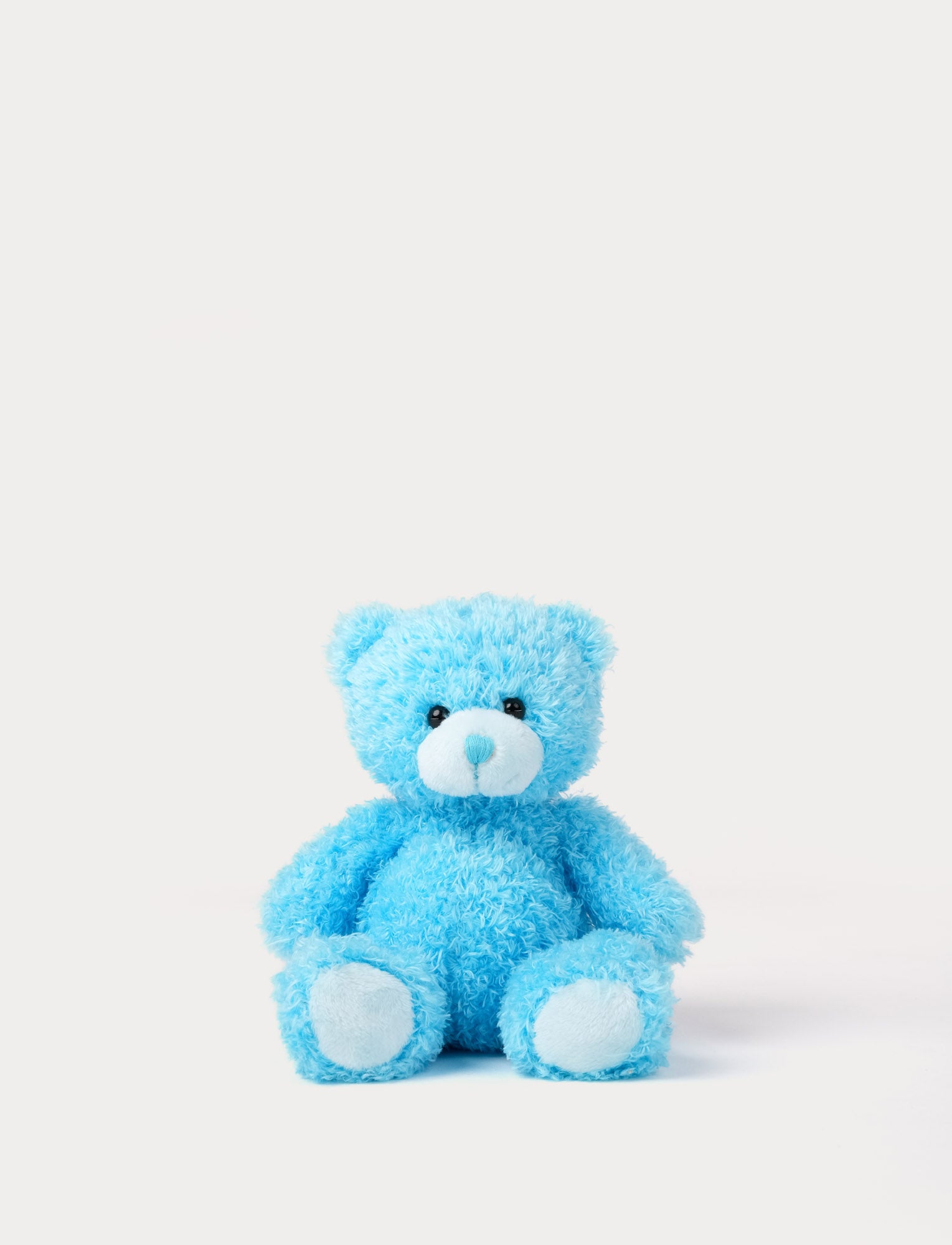  Image of Blue teddy bear on a white background