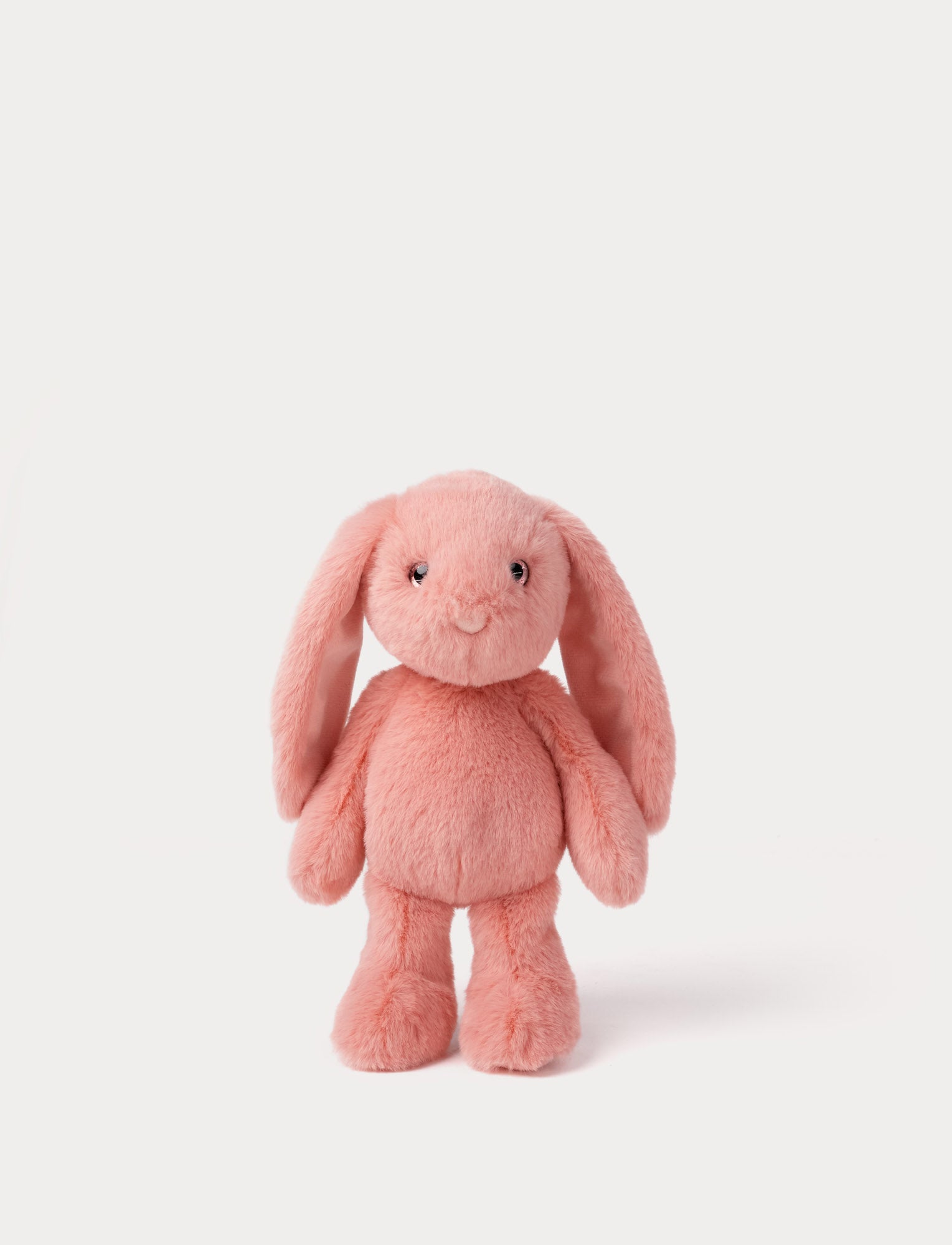  Image of Pink plush bunny toy on a white background