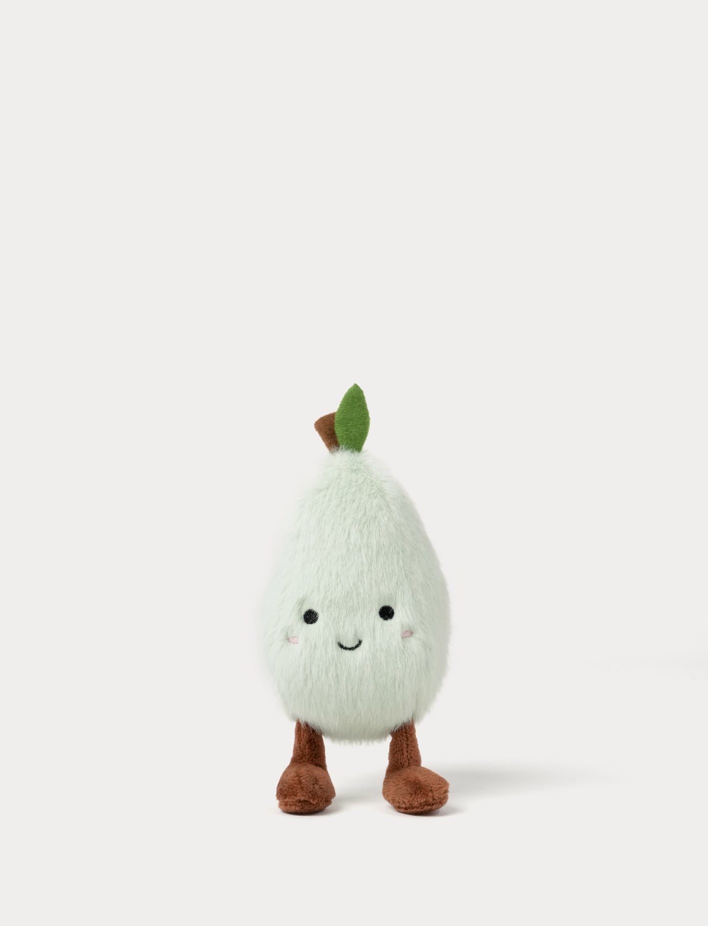 Plush toy shaped like a pear with a smiling face and cute legs