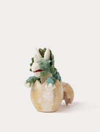 Plush dino hand puppet in a dino egg