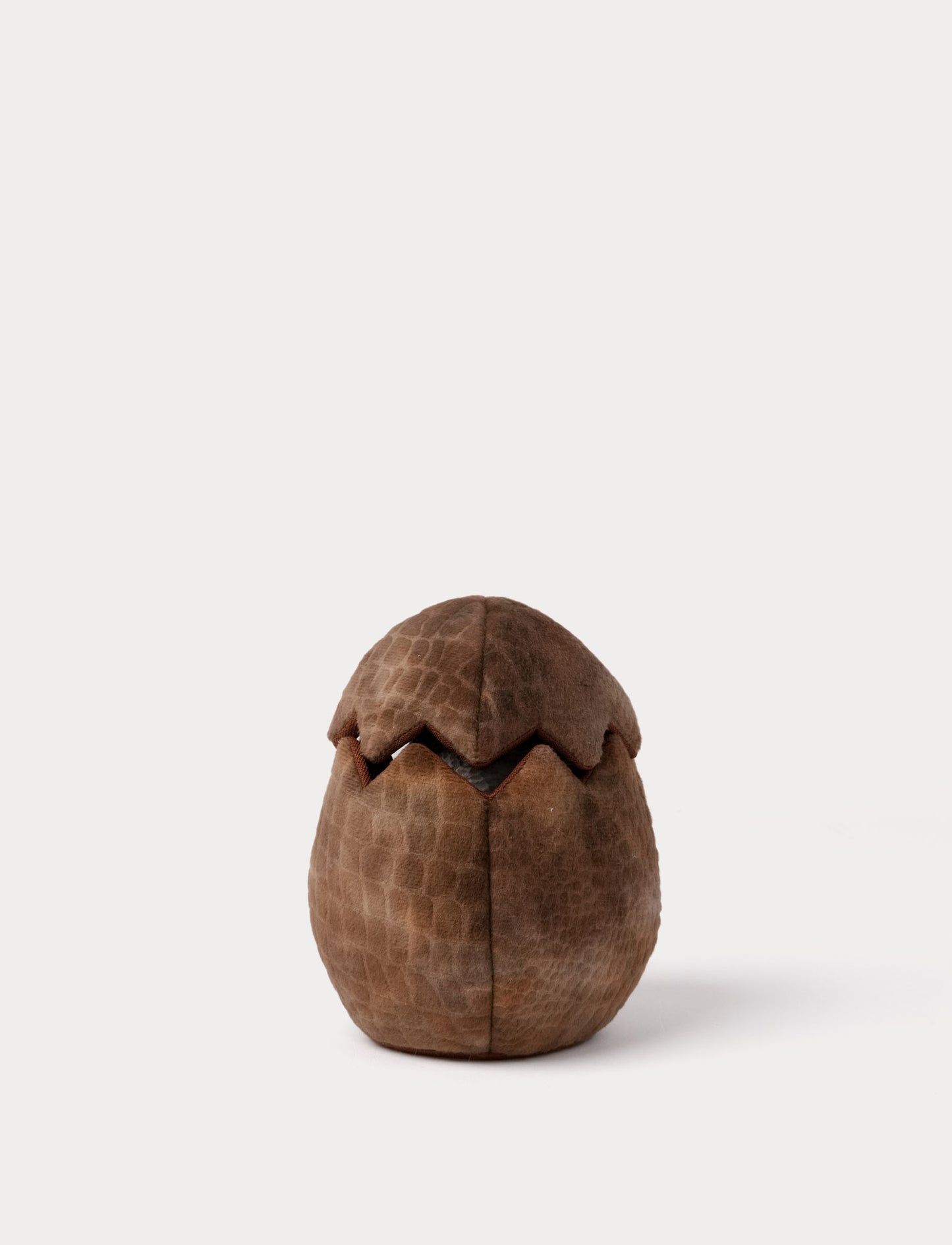 Handdocka, Stegosaurus i ägg