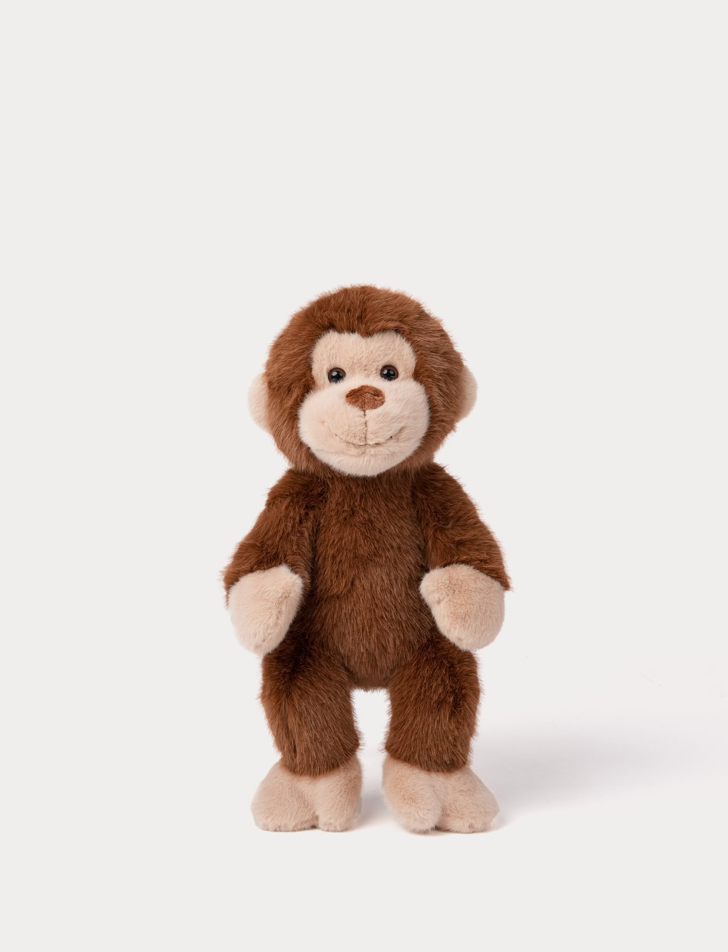 Stuffed monkey toy on a white background
